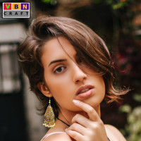 Gold Colored Dangler Earrings With White Beads Gold Colored Dangler Earrings With White Beads
